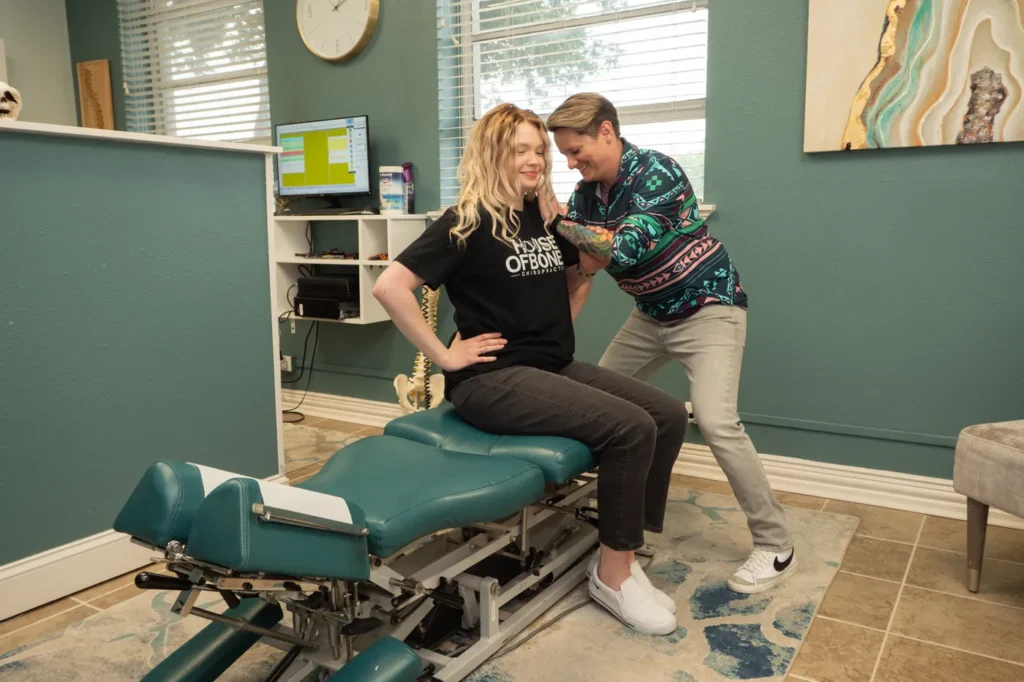 Dr Jordan Walsh working with a female patient